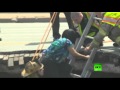 إنهيار مخيف في أحد الشوارع يبتلع سيارة - فيديو