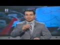 مذيع سوري يبتلع ذبابة أثناء دفاعه عن بشار الاسد