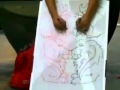 رسام يرسم بيده اليمين واليسار بنفس الوقت !!!!